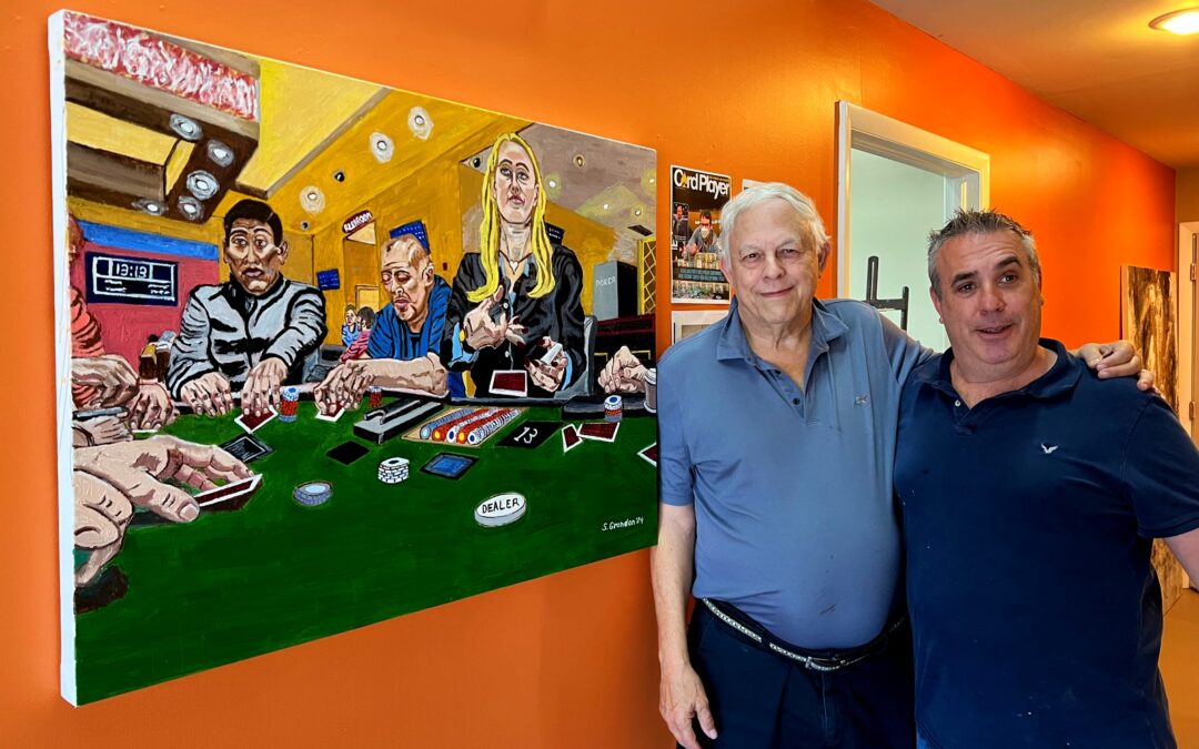 Stanley Grandon and Chris Berlini standing in front of Stan's newest artwork.